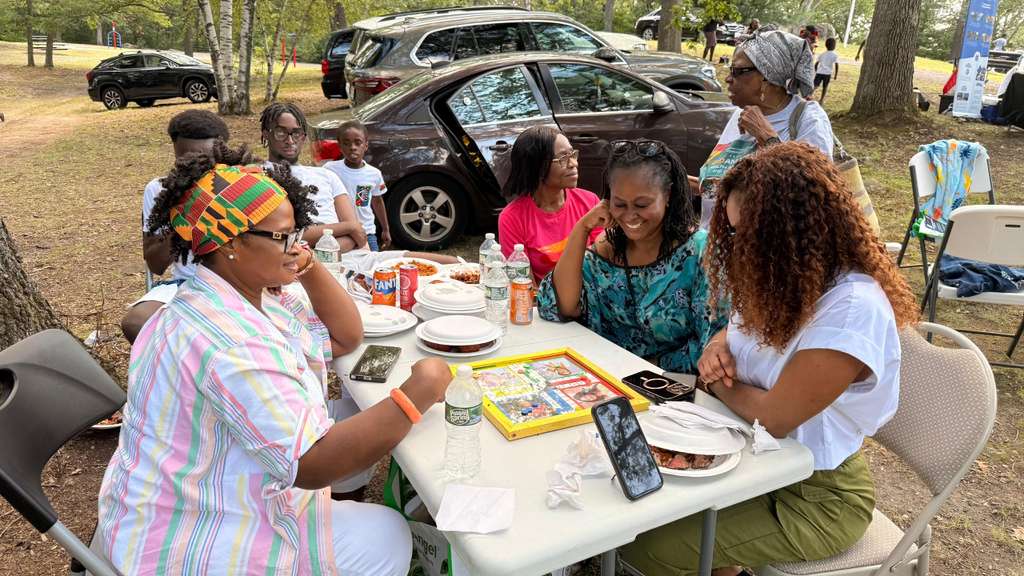 Community members enjoying lawn games