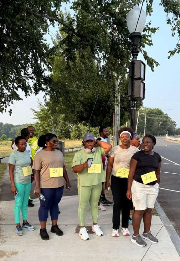 Ghanaian community members in workout outfit